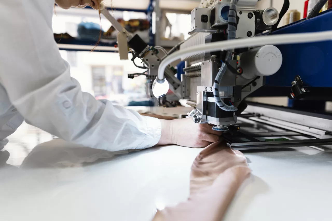 Manufacturer working on a garment