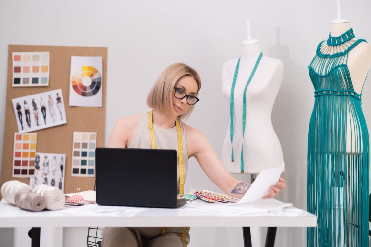 A fashion designer creating her Bill of Materials.