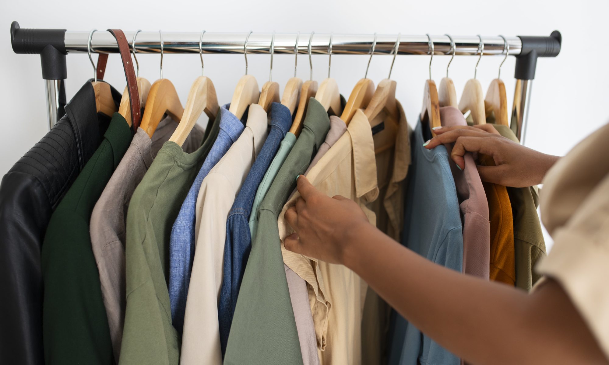 Person looking through clothes rack