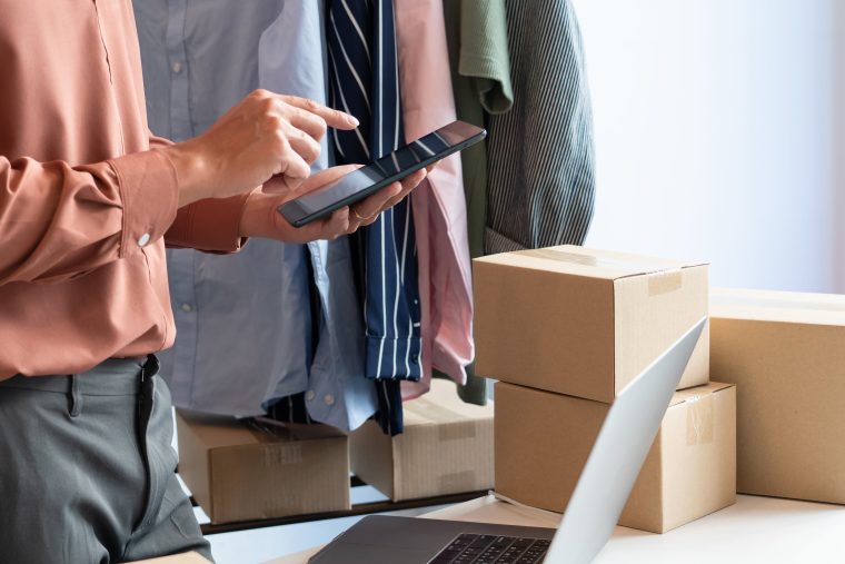 Business owner preparing order with tablet