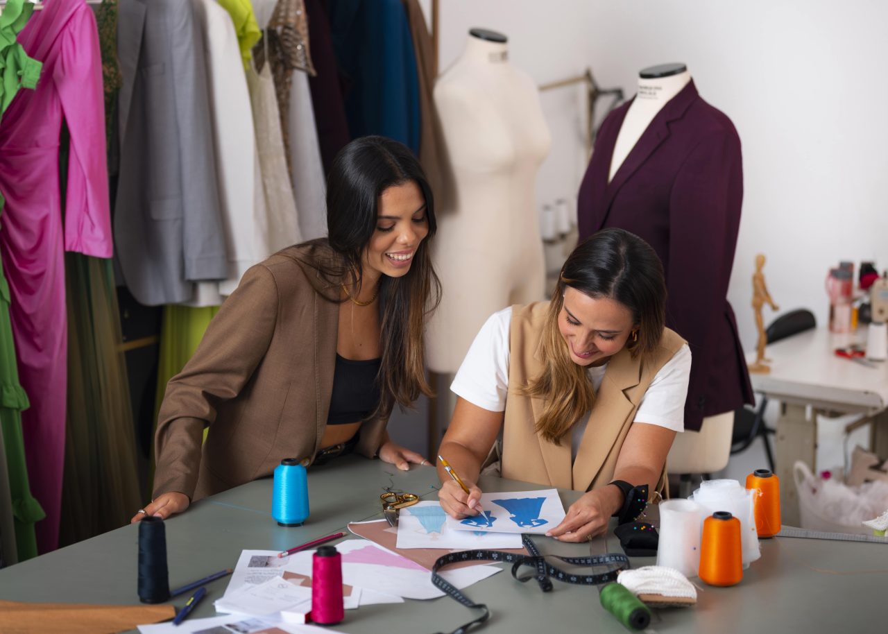 Fashion designers-collaborating in a studio