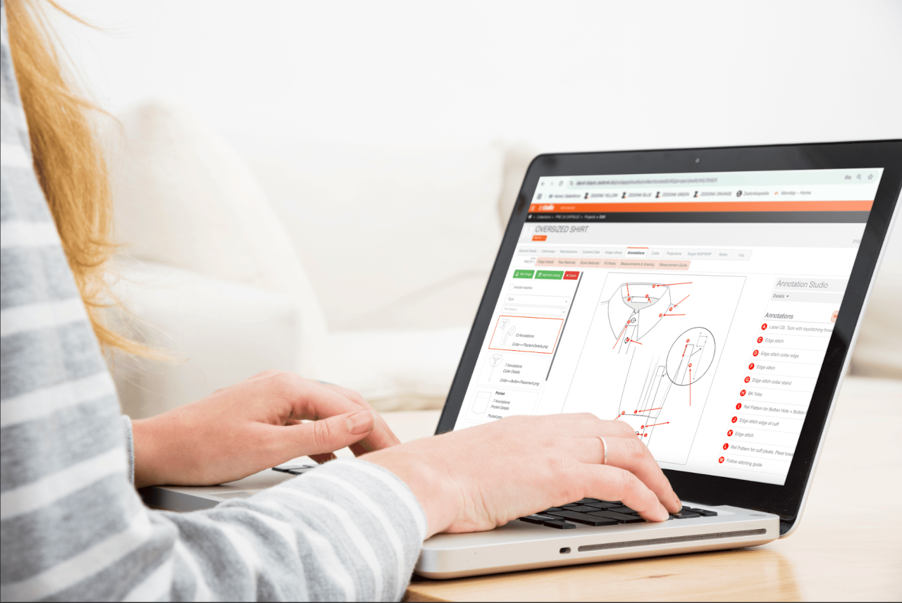 Person using Zstudio PLM software on laptop