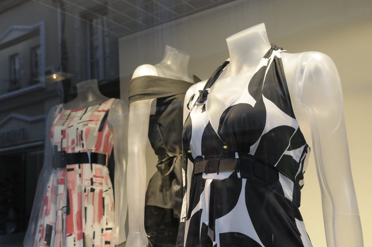 Clothes on mannequins in a shop window